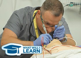 man learning how to perform a medical procedure on a dummy