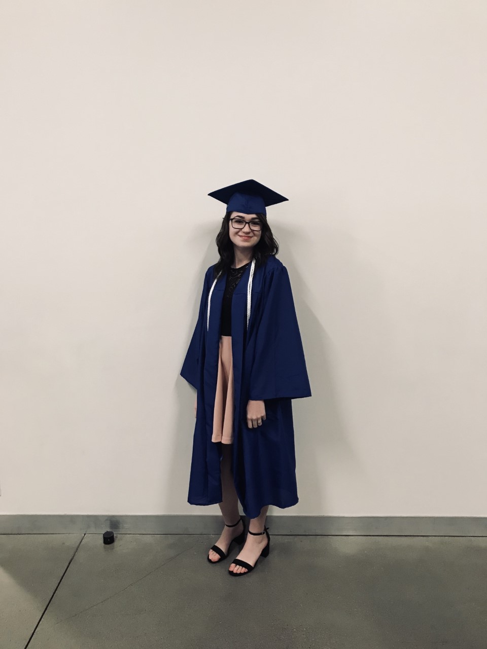 Dental Assisting Graduate in Cap N Gown